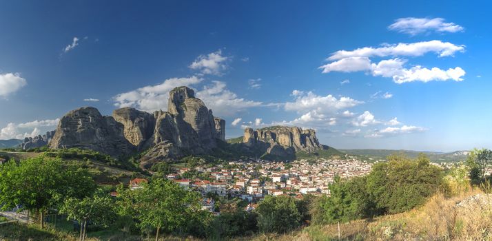 Panoramic view of the Kalambaka town at the foot of the Meteora Mountains in Greece on a sunny summer day