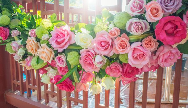 Rose and warm light in garden background , beautiful moments of love and happy life.
