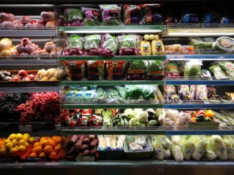 Blurred of product shelves in supermarket or grocery store, use as background
