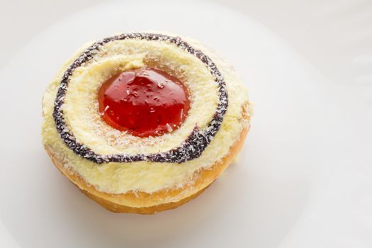 Donut on a white plate, donut with white background
