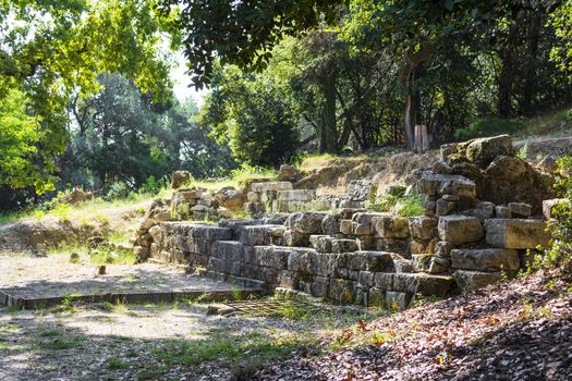 Ruins of an ancient temple in Mon Repos park at Corfu island in Greece