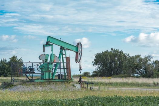 Rocking machines for oil production in a private sector in Canada