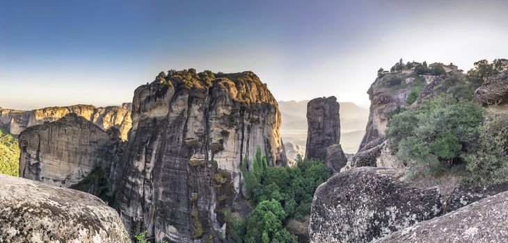 Panoramic view of the Great Meteoron Monastery in Meteora, Kalambaka town in Greece, on a summer evening