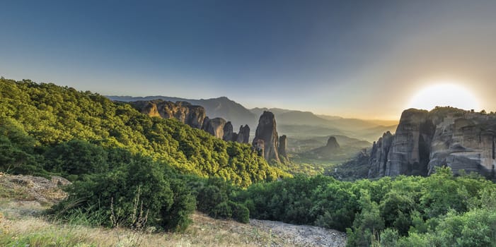 Panoramic view of the Rousanou Monastery in Meteora, Kalambaka town in Greece, on a sunny summer evening