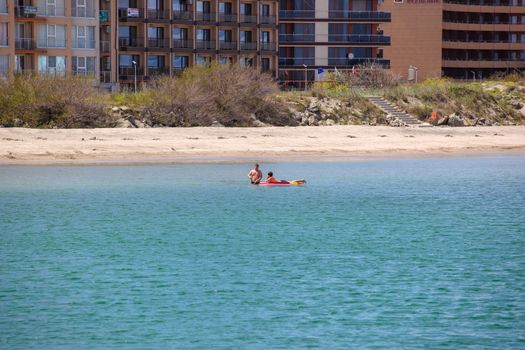 Pomorie, Bulgaria - May 01, 2019: Kids Playing At Sea.