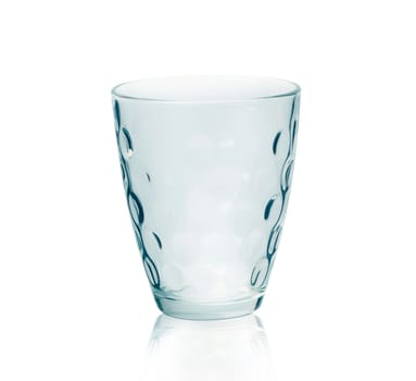 Empty stemless water glass isolated on white background. With clipping path