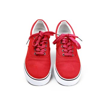 A pair of Red color canvas shoes isolated on white background with clipping path