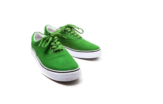 A pair of Green canvas shoes isolated on white background with clipping path