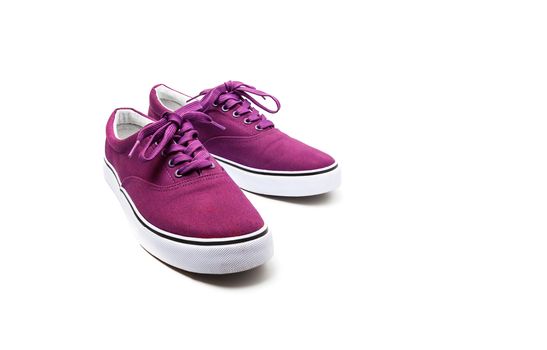 A pair of Pink canvas shoes isolated on white background with clipping path