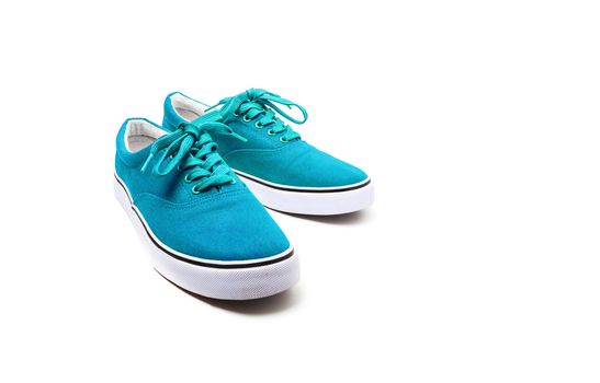 A pair of Blue canvas shoes isolated on white background with clipping path