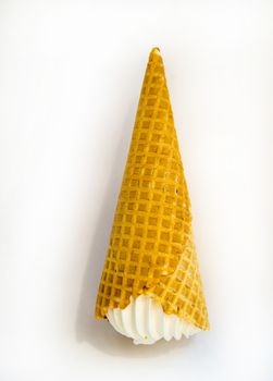 Ice cream cone fell upside down on white background, upside down object.