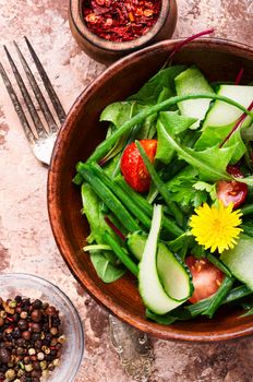 Vegetable salad with fresh lettuce.Healthy spring salad.Mixed leaf salad