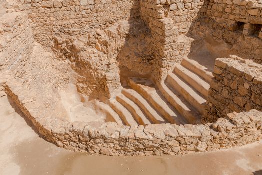 Ruins of the rjewish ritual bath in ancient Masada fortress in Israel,build by Herod the great