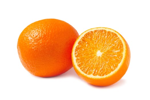 Fresh oranges, one whole and one half isolated on white background with shadow.