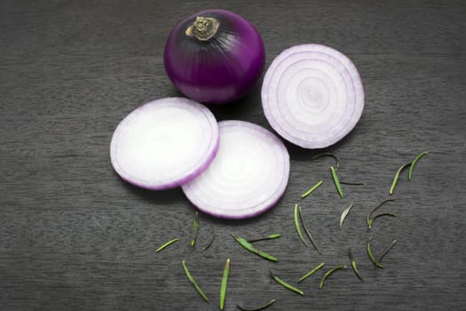 Sliced Onions and some Traces of Rosemary in the Kitchen