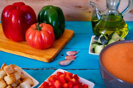 View of gazpacho, a typical Spanish meal with its ingredients in composition