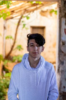 Young boy posing in abandoned house