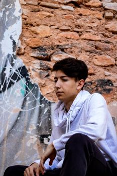 Young boy posing in abandoned house