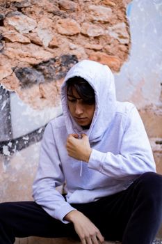 Young boy posing in abandoned house