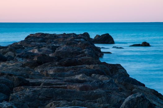 Breakwater at Burriana beach in long exposure