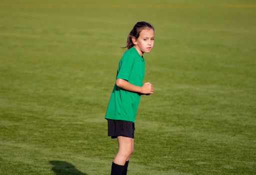 Little girl in a soccer training in Burriana