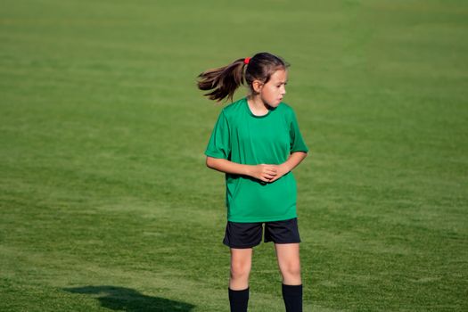 Little girl in a soccer training in Burriana