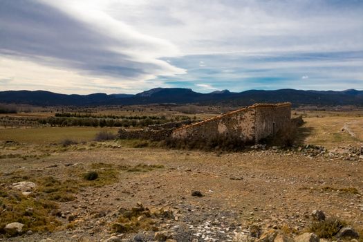 Old abandoned stone house on the mountain