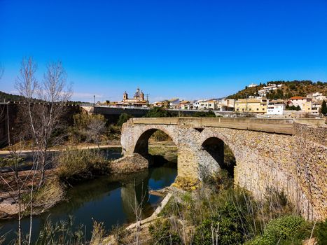 Ruined stone bridge in the village of Sot de Ferrer