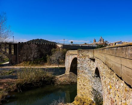 Ruined stone bridge in the village of Sot de Ferrer