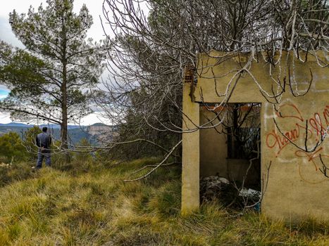Abandoned house invaded by nature on the mountain