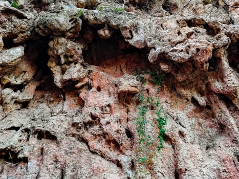 Natural rock background in brown and purple tones