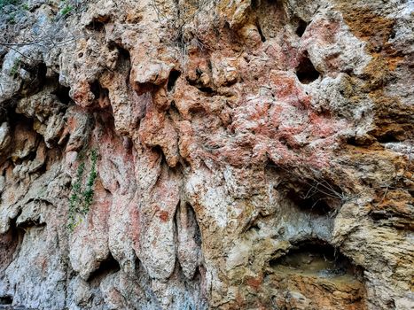 Natural rock background in brown and purple tones