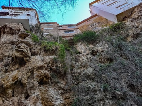 View from below of the hanging houses of Viver