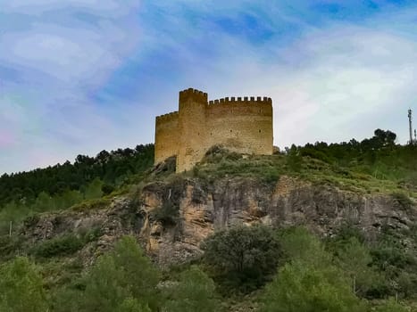 View of the old castle of Gaibiel with cloudy sky