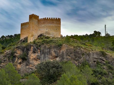 View of the old castle of Gaibiel with cloudy sky
