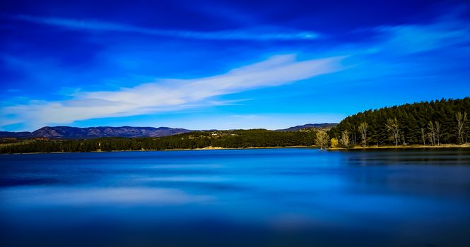 View of the Regajo reservoir with the mountains in the background