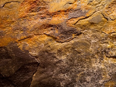 Natural rock background in brown and purple tones