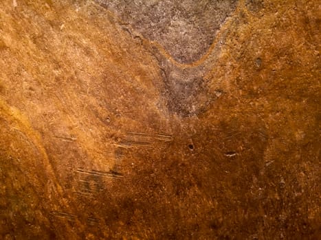 Natural rock background in brown and purple tones