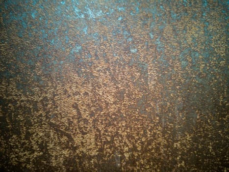 Rusty metal background with rough texture in brown tones