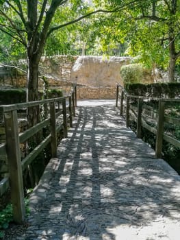 Bridge in a natural landscape with wooden railings