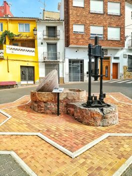 Ancient stone mill to make olive oil exposed in the town square