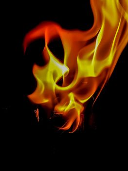 Fire in orange and yellow tones with peculiar shapes with black background