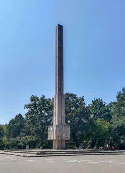 Tall stone tower in the Crang park in Romania