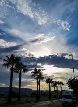 Sunset with threatening storm clouds over mountains