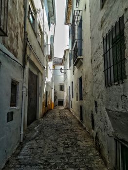 Nice white alley with very old houses in the town of Segorbe