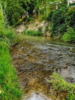 View of Palancia river a lot of vegetation as it passes through Segorbe