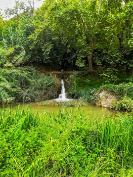 View of Palancia river a lot of vegetation as it passes through Segorbe