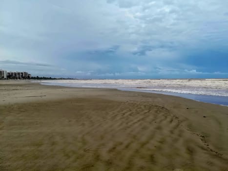 Beach of fine brown sand bathed by the waters of the Mediterranean Sea