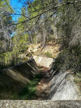 Old irrigation canal lost in a mountain of Navajas