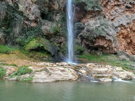 View of a waterfall from El Salto de la Novia in Navajas